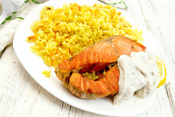 Image showing Salmon with rice on light board