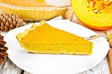 Image showing Pie pumpkin in plate on light board