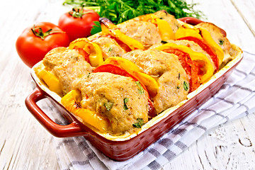 Image showing Cutlets of turkey with peppers in pan on board