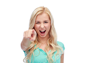 Image showing happy young woman pointing finger to you