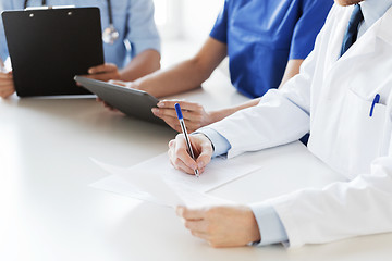 Image showing close up of happy doctors at seminar or hospital