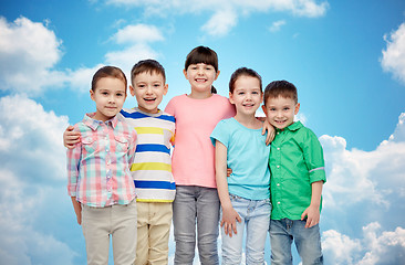 Image showing happy smiling little children hugging