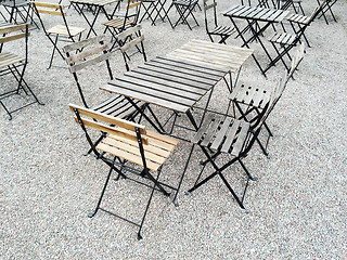 Image showing Outdoor cafe with wooden tables