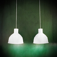 Image showing White lamps on green grungy background