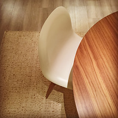 Image showing Round table and white stylish chair