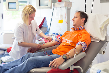 Image showing Blood donor at donation.