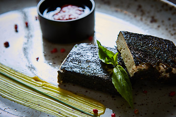 Image showing Tofu fried in nori. Served with sauce
