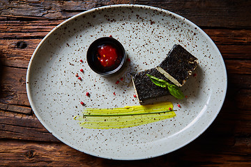 Image showing Tofu fried in nori. Served with sauce