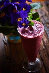 Image showing Delicious berry smoothie on table