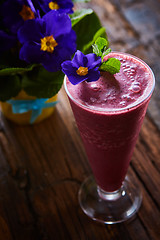 Image showing Delicious berry smoothie on table