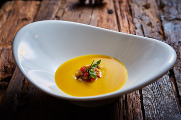 Image showing Delicious cream soup made of lentil and vegetables on table