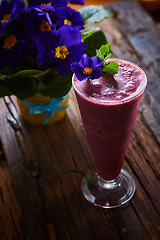 Image showing Delicious berry smoothie on table