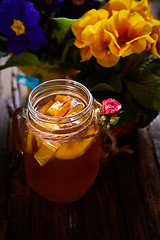 Image showing Ginger tea with orange, spices and honey.