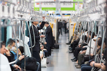 Image showing Passengers traveling by Tokyo metro.