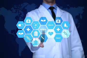 Image showing Medical doctor working with healthcare icons. Modern medical technologies concept