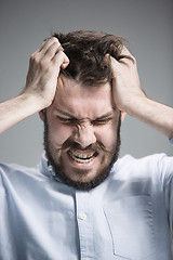 Image showing Close up face of desperate man 