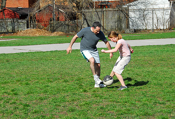 Image showing Playing soccer