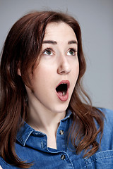 Image showing Portrait of young woman with shocked facial expression