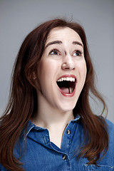 Image showing Portrait of young woman with shocked facial expression