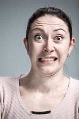 Image showing Portrait of young woman with shocked facial expression