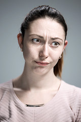 Image showing The portrait of a beautiful sad girl closeup