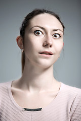 Image showing Portrait of young woman with shocked facial expression