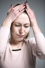 Image showing The portrait of a beautiful sad girl closeup