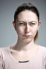 Image showing The portrait of a beautiful sad girl closeup