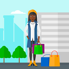 Image showing Buyer with shopping bags.