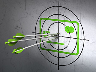 Image showing Business concept: arrows in Credit Card target on wall background