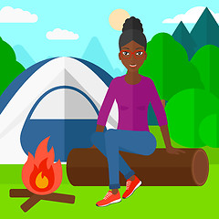 Image showing Woman sitting at camp.