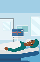 Image showing Patient lying in hospital bed with heart monitor.