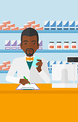 Image showing Pharmacist taking notes.