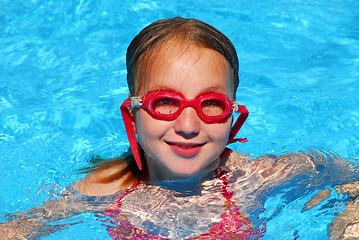 Image showing Girl swim pool