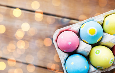 Image showing close up of colored easter eggs in egg box