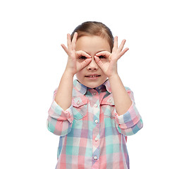 Image showing happy little girl making faces and having fun