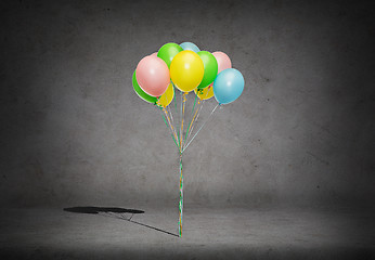 Image showing bunch of colorful helium balloons