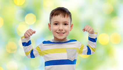 Image showing happy smiling little boy with raised hand