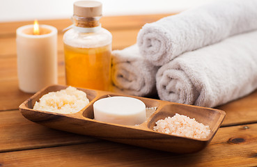 Image showing close up of soap, himalayan salt and scrub in bowl