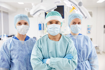 Image showing group of surgeons in operating room at hospital