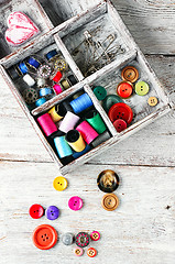 Image showing Buttons and spool of thread