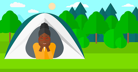 Image showing Woman lying in tent.