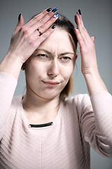 Image showing The portrait of a beautiful sad girl closeup