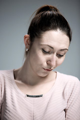 Image showing The portrait of a beautiful sad girl closeup