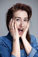 Image showing Portrait of young woman with shocked facial expression