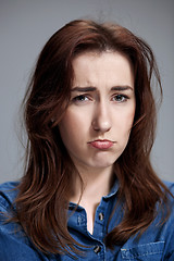 Image showing The portrait of a beautiful sad girl closeup