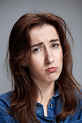 Image showing The portrait of a beautiful sad girl closeup