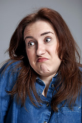 Image showing Portrait of young woman with shocked facial expression