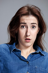 Image showing Portrait of young woman with shocked facial expression