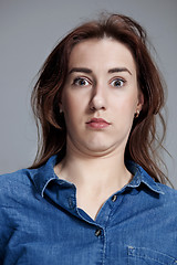 Image showing Portrait of young woman with shocked facial expression